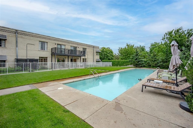 1000 NW 37th St Unit 1000 & 1002, Oklahoma City, OK 73118 - view of pool featuring a lawn, fence, a fenced in pool, and a patio