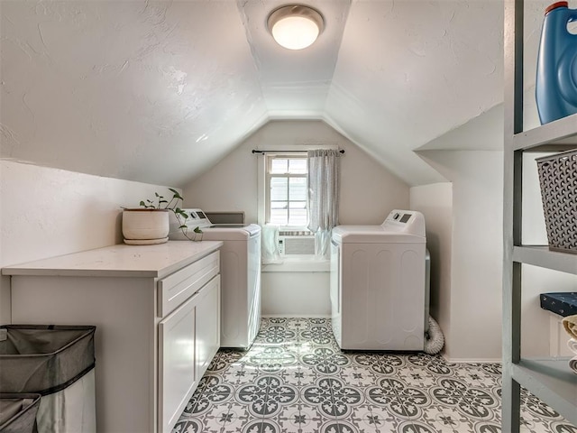 laundry area featuring washer and clothes dryer and cooling unit