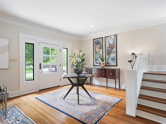 office space with baseboards, ornamental molding, recessed lighting, and wood finished floors
