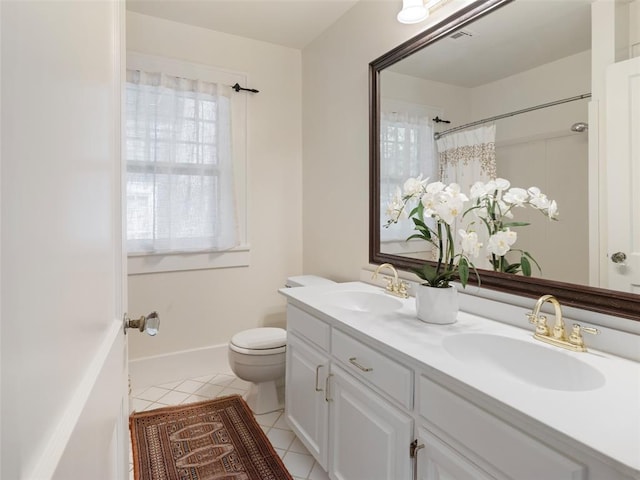 full bathroom with a shower with shower curtain, toilet, a sink, and tile patterned flooring