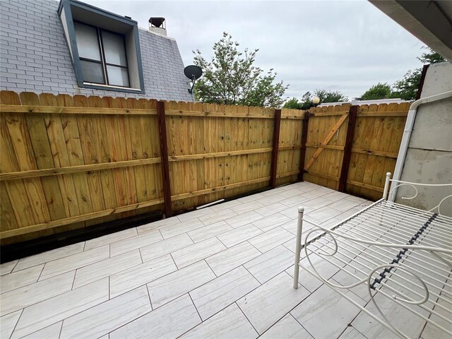 view of patio / terrace with fence