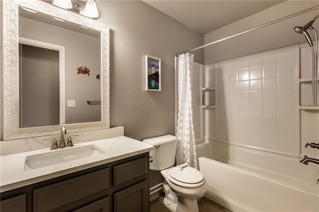 bathroom featuring toilet, a textured wall, shower / bath combo, and vanity