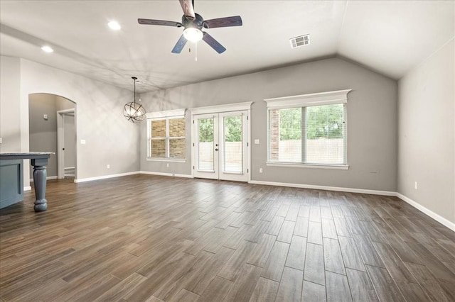 1016 NW 191st St, Edmond, OK 73012 - unfurnished living room featuring arched walkways, dark wood finished floors, ceiling fan with notable chandelier, baseboards, and visible vents