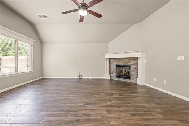 1016 NW 191st St, Edmond, OK 73012 - unfurnished living room with visible vents, a fireplace, dark wood finished floors, a ceiling fan, and vaulted ceiling