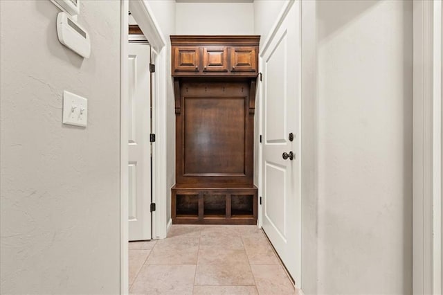 1016 NW 191st St, Edmond, OK 73012 - mudroom featuring a textured wall