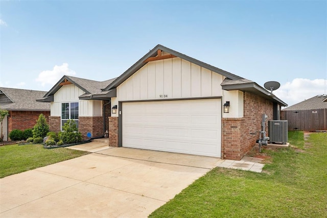 9104 SW 47th St, Oklahoma City, OK 73179 - ranch-style home with a garage, a front yard, and brick siding