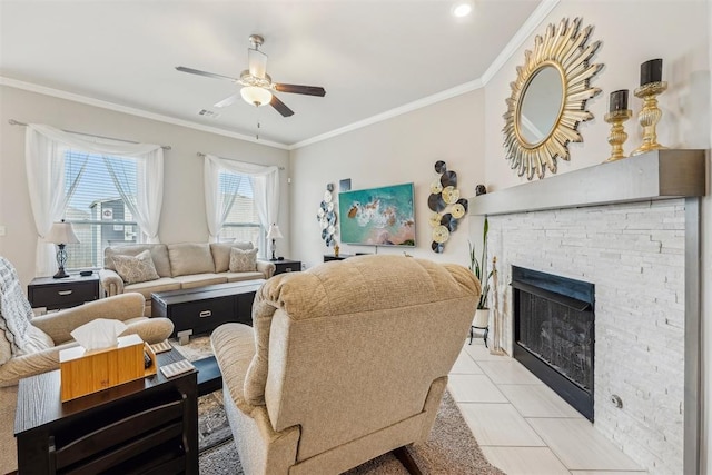 9104 SW 47th St, Oklahoma City, OK 73179 - living room with crown molding, a ceiling fan, light tile patterned floors, and a fireplace