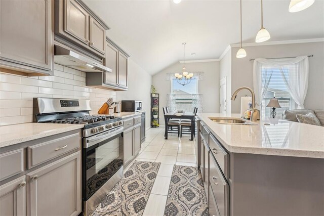9104 SW 47th St, Oklahoma City, OK 73179 - kitchen featuring a sink, appliances with stainless steel finishes, and gray cabinetry