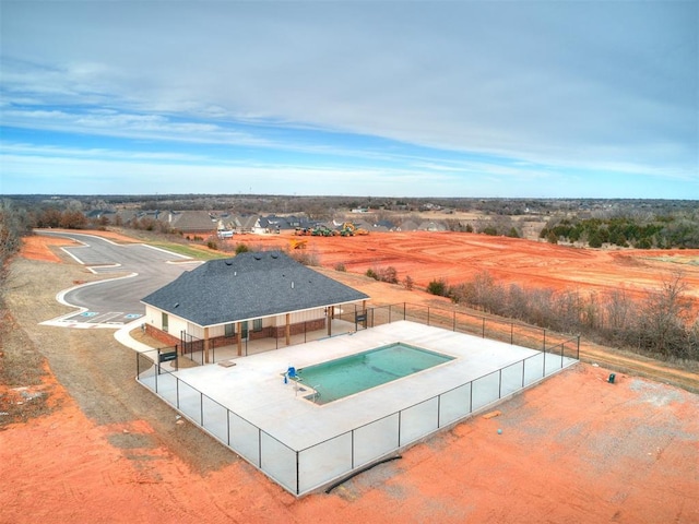 view of swimming pool with a patio, a fenced in pool, and a fenced backyard