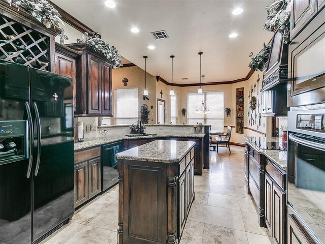 kitchen with crown molding, dark brown cabinetry, a peninsula, visible vents, and black appliances