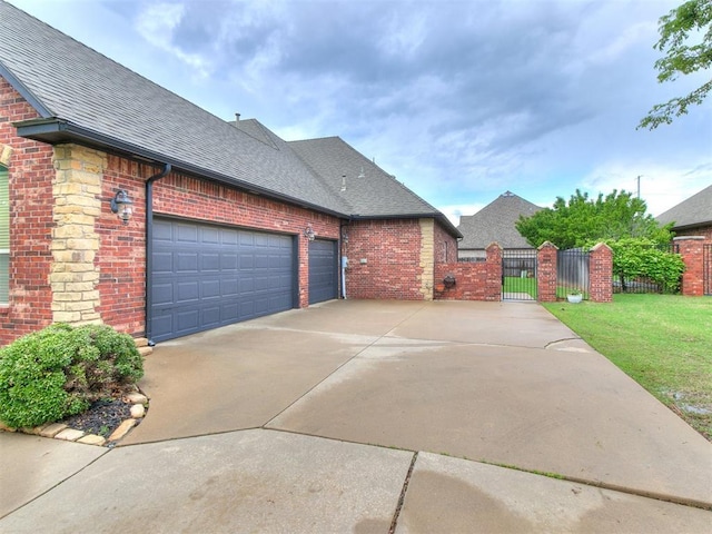 exterior space featuring roof with shingles, a gate, and brick siding