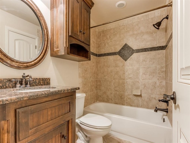 full bath featuring shower / bath combination, toilet, and vanity