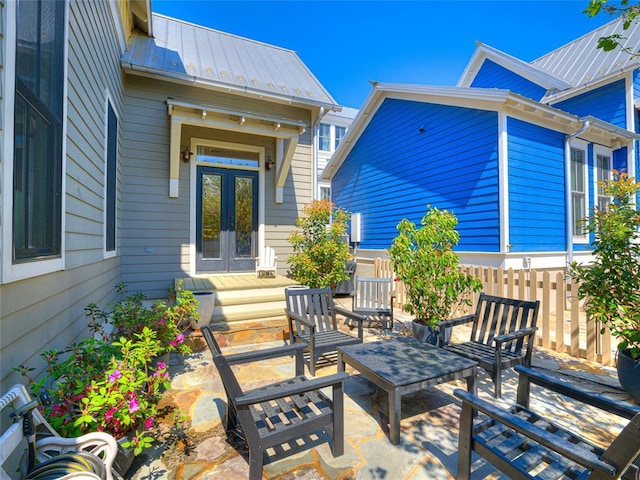 34 Boardwalk Unit B, Carlton Landing, OK 74432 - view of patio featuring french doors and fence