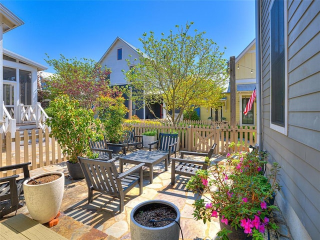 34 Boardwalk Unit B, Carlton Landing, OK 74432 - view of patio / terrace featuring fence and a sunroom