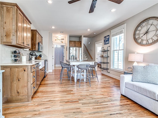 34 Boardwalk Unit B, Carlton Landing, OK 74432 - dining room with ceiling fan, stairway, baseboards, light wood-style floors, and recessed lighting