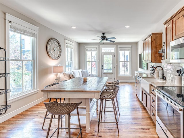 34 Boardwalk Unit B, Carlton Landing, OK 74432 - dining room with recessed lighting, baseboards, and light wood-type flooring