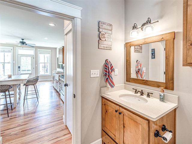 34 Boardwalk Unit B, Carlton Landing, OK 74432 - bathroom featuring vanity, wood finished floors, baseboards, recessed lighting, and a ceiling fan