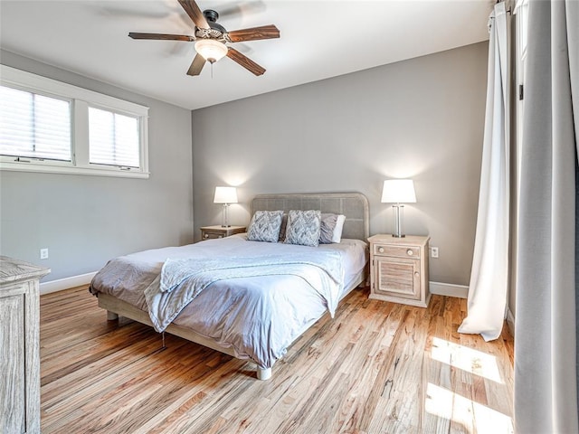 34 Boardwalk Unit B, Carlton Landing, OK 74432 - bedroom featuring baseboards, ceiling fan, and light wood finished floors