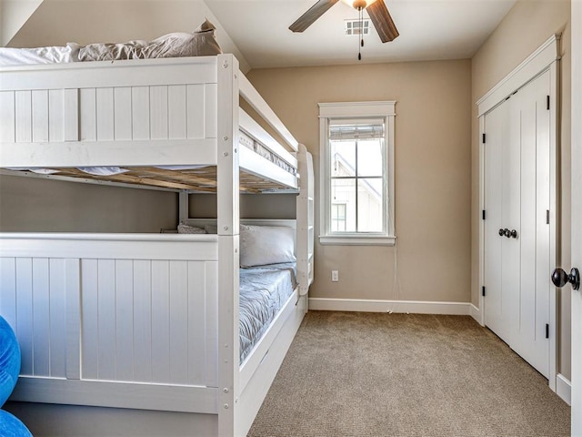 34 Boardwalk Unit B, Carlton Landing, OK 74432 - unfurnished bedroom with carpet, a ceiling fan, baseboards, visible vents, and a closet