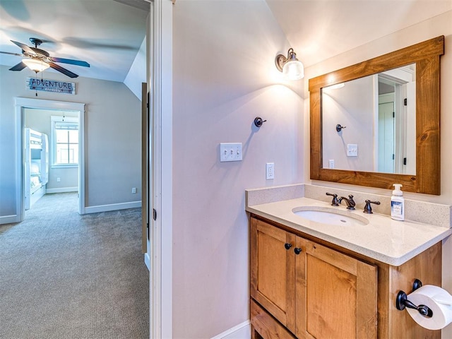 34 Boardwalk Unit B, Carlton Landing, OK 74432 - bathroom with vanity, baseboards, ceiling fan, and vaulted ceiling