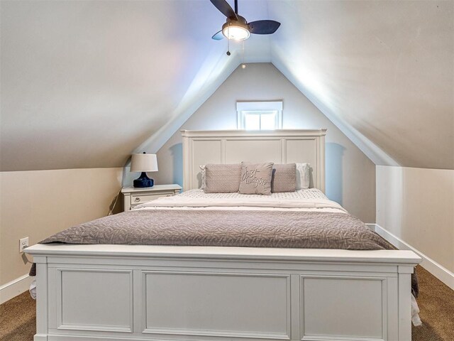 34 Boardwalk Unit B, Carlton Landing, OK 74432 - bedroom featuring baseboards, a ceiling fan, vaulted ceiling, and dark colored carpet