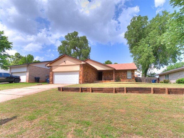 11817 Hollyrock Dr, Yukon, OK 73099 - ranch-style home with a garage, driveway, and brick siding