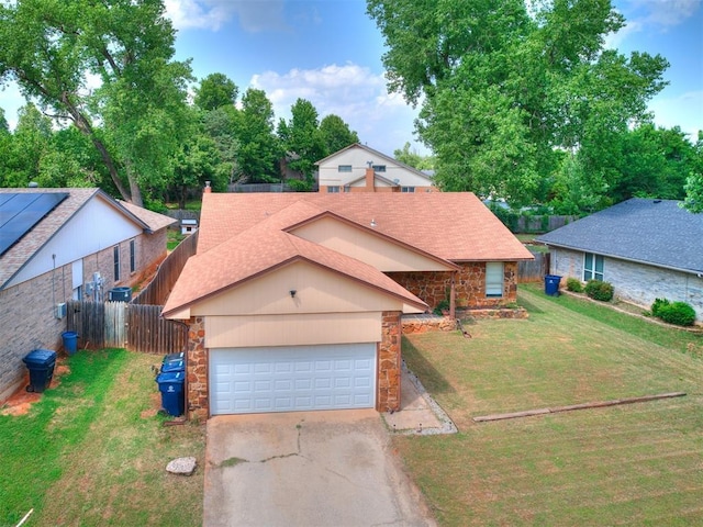 11817 Hollyrock Dr, Yukon, OK 73099 - view of front of house with stone siding, driveway, roof with shingles, and a garage