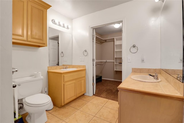 8713 Starling Path, Edmond, OK 73034 - full bath with vanity, tile patterned flooring, toilet, and a spacious closet