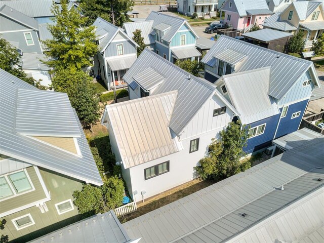 birds eye view of property with a residential view