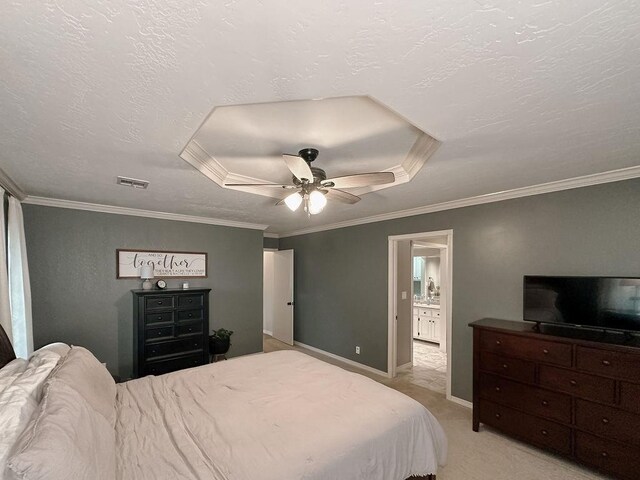 carpeted bedroom with ceiling fan, a textured ceiling, visible vents, crown molding, and baseboards