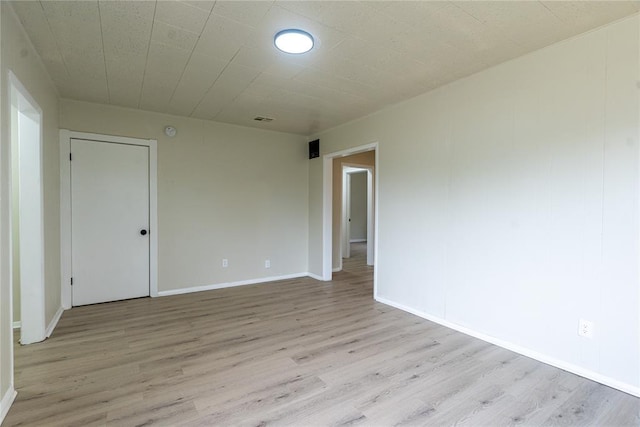 624 SW 44th St, Oklahoma City, OK 73109 - unfurnished room featuring light wood-style floors and baseboards