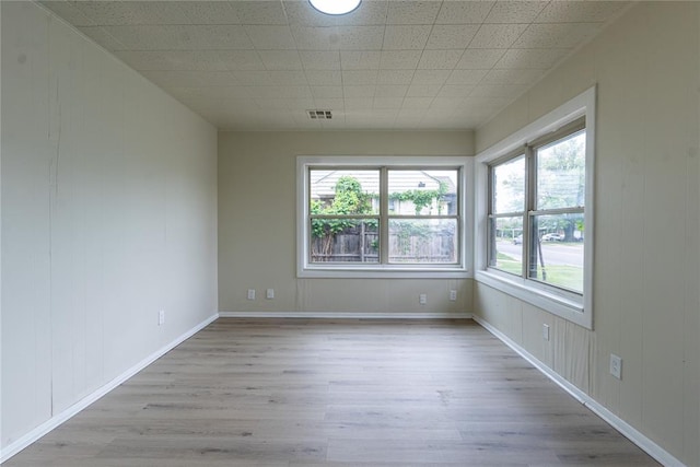 624 SW 44th St, Oklahoma City, OK 73109 - empty room with baseboards, wood finished floors, and visible vents
