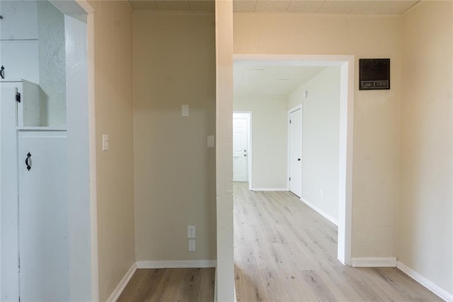 624 SW 44th St, Oklahoma City, OK 73109 - corridor featuring baseboards and light wood-style flooring
