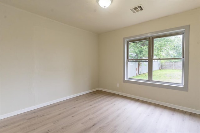624 SW 44th St, Oklahoma City, OK 73109 - unfurnished room featuring light wood-style floors, baseboards, and visible vents