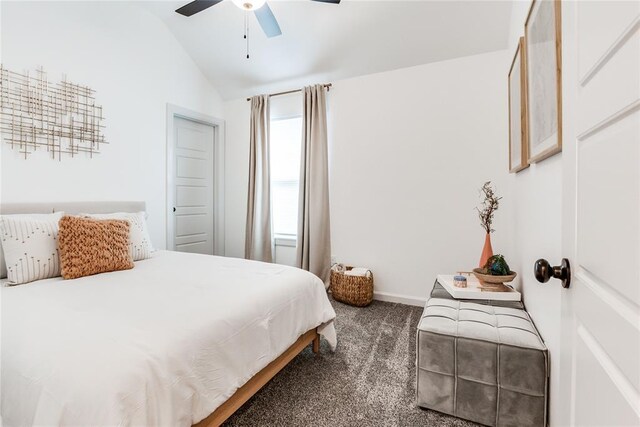 carpeted bedroom with a ceiling fan, baseboards, and vaulted ceiling