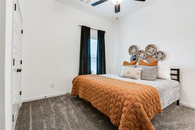 bedroom featuring carpet floors, baseboards, visible vents, and ceiling fan