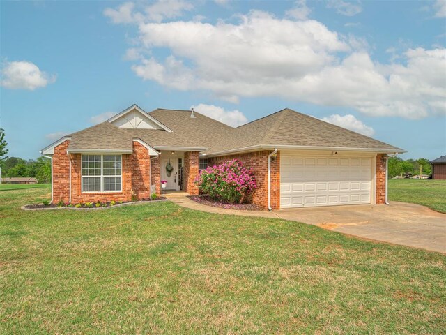 single story home featuring roof with shingles, brick siding, a garage, a front yard, and driveway