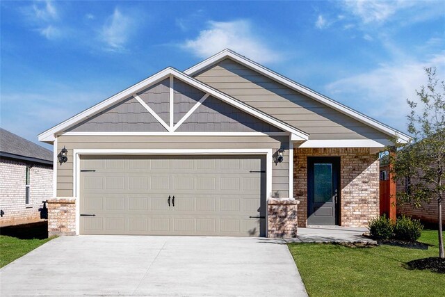 9336 NW 126th St, Yukon, OK 73099 - craftsman inspired home with an attached garage, a front lawn, and concrete driveway