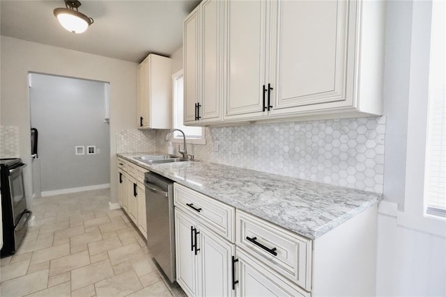 kitchen with stainless steel dishwasher, a sink, black range with electric cooktop, tasteful backsplash, and healthy amount of natural light