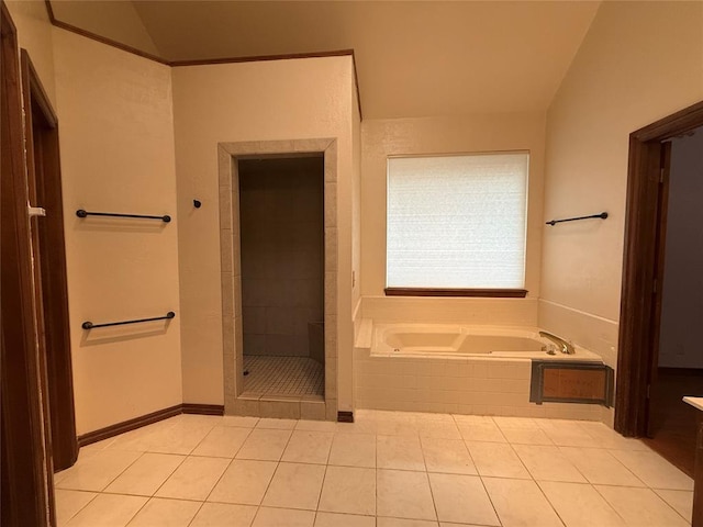 3900 Chickasha, Edmond, OK 73013 - full bath with tile patterned flooring, a bath, vaulted ceiling, and a shower stall