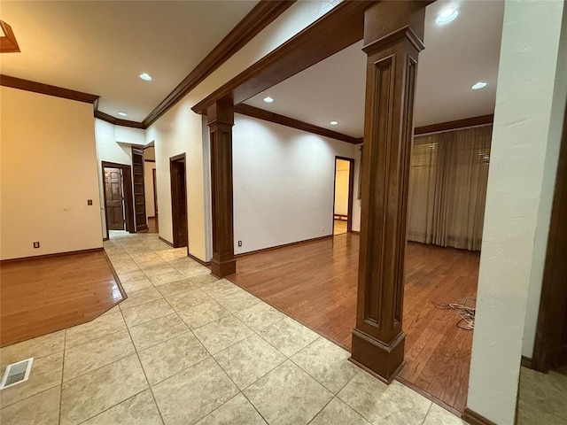 3900 Chickasha, Edmond, OK 73013 - interior space featuring ornate columns, crown molding, visible vents, and light wood-type flooring