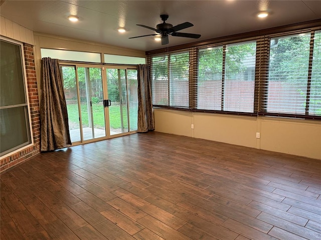 3900 Chickasha, Edmond, OK 73013 - unfurnished sunroom featuring wood finished floors