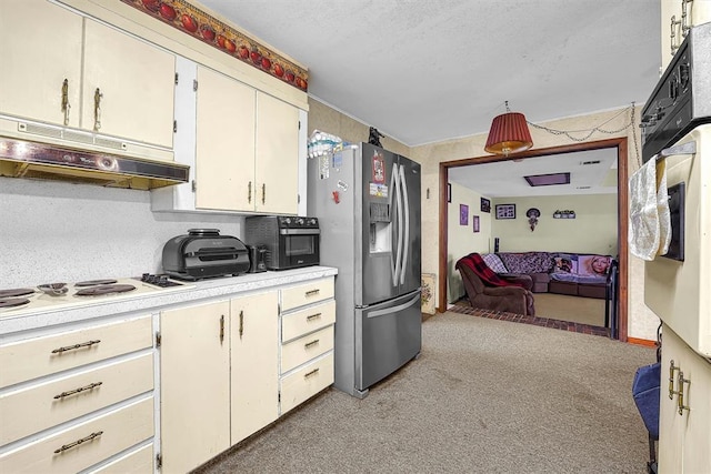 kitchen with light colored carpet, white appliances, light countertops, open floor plan, and under cabinet range hood