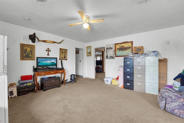 interior space featuring carpet flooring and a ceiling fan