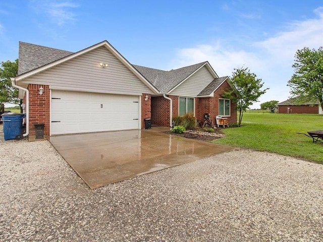 ranch-style home featuring a shingled roof, an attached garage, a front lawn, brick siding, and driveway