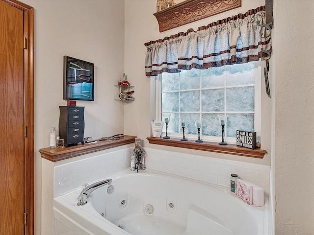 full bathroom featuring a jetted tub