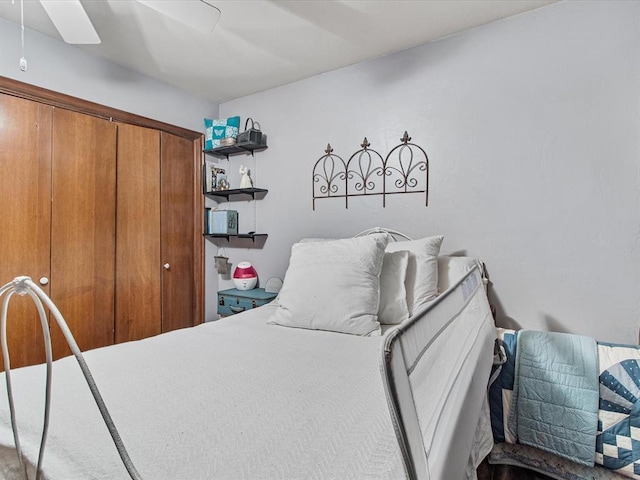 bedroom with a closet and a ceiling fan