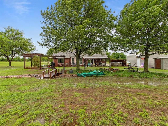 view of yard with a pergola