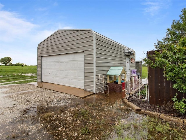 detached garage with fence