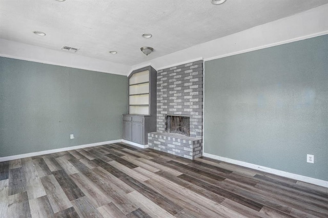 1824 David Ter, Oklahoma City, OK 73141 - unfurnished living room with baseboards, visible vents, and dark wood finished floors